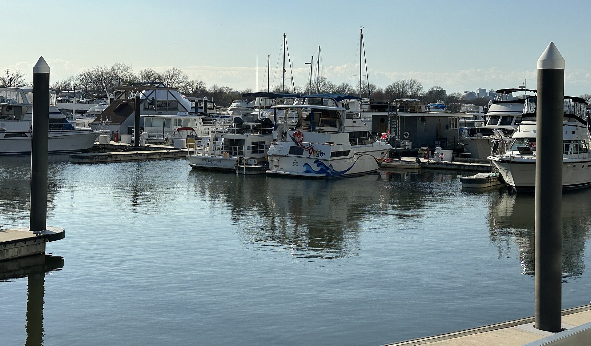 Boats moored along the piers at The Wharf